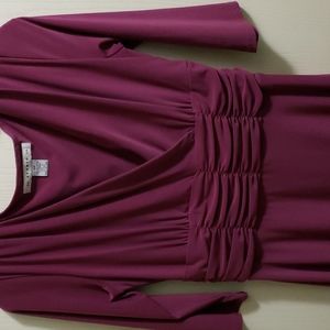 Burgundy colored mid length dress